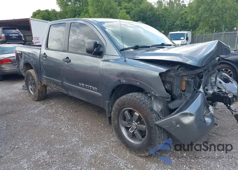 2014 Nissan Titan Pro-4X z USA, uszkodzony, nr VIN 1N6BA0EC4EN509573